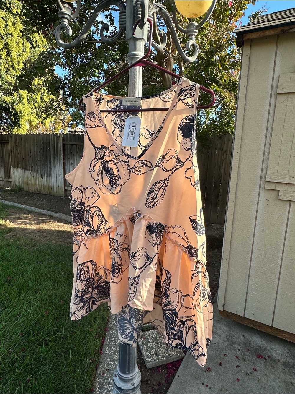 Sleeveless Peach Floral V-Neck Peplum Tunic